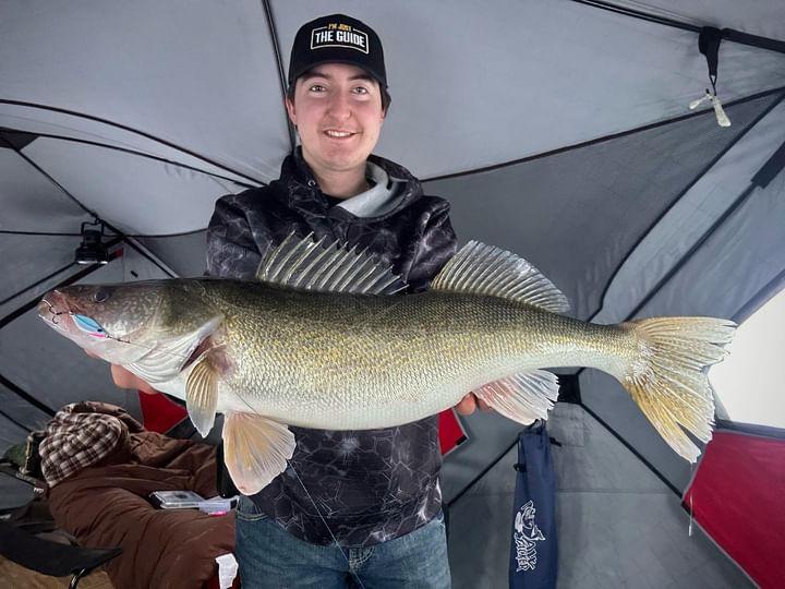 Imagine hauling in a winter walleye beast like the one in this photo! High Caliber Lures (HCL) equips you with the jigging spoons to conquer trophy walleye. Our walleye glow jigs are meticulously crafted for superior performance in low-light conditions. Their lifelike action and irresistible glow entice even the most cautious walleye. Atomic Pro Blades are one of the best lures to catch big walleye with when jigging.