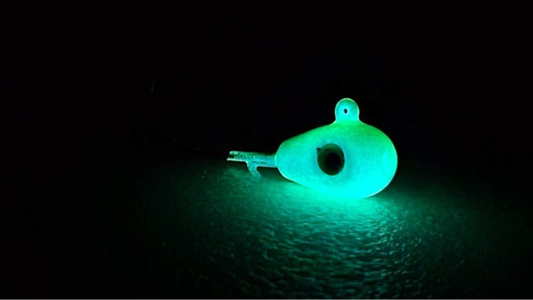 UV Bomb, UV GLOW blue walleye jigs,  GLOW jigs, walleye jigs, GLOW jighead, custom jigs, fishing tackle, fishing lures, walleye glow jig, pike glow jig, pike jig, canadian made jigs, UV green glow jigs