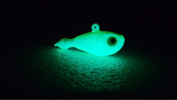 UV Bomb, UV GLOW blue walleye jigs,  GLOW jigs, walleye jigs, GLOW jighead, custom jigs, fishing tackle, fishing lures, walleye glow jig, pike glow jig, pike jig, canadian made jigs, UV green glow jigs